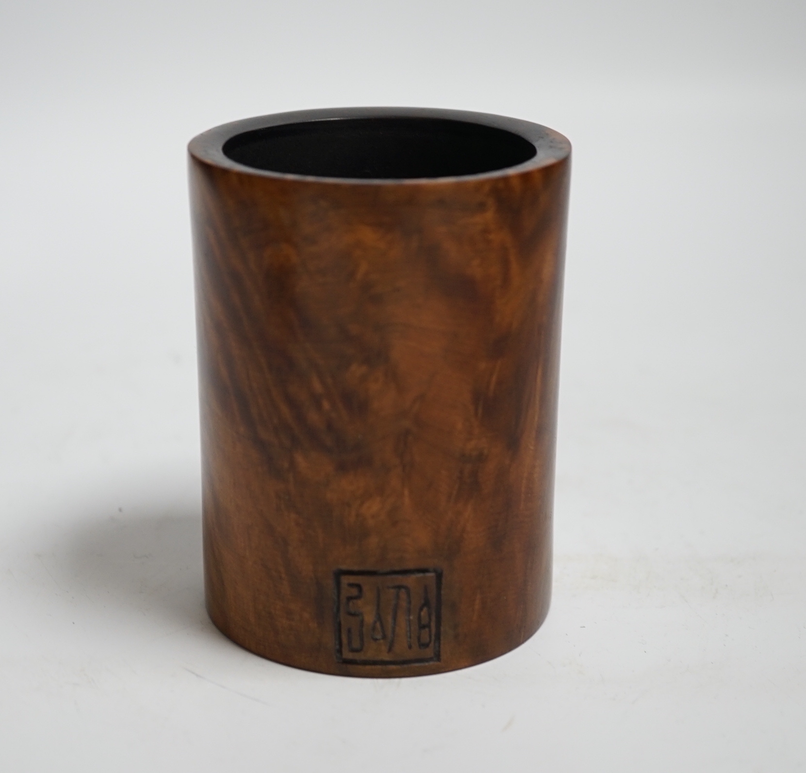 A Chinese burr wood brush pot with traces of lacquer, signed, 9cm